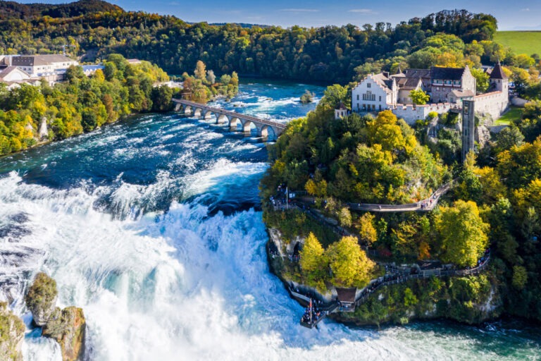 https://nomadicglobe.com/wp-content/uploads/2024/03/Rhine-Falls-in-Switzerland-768x512.jpg