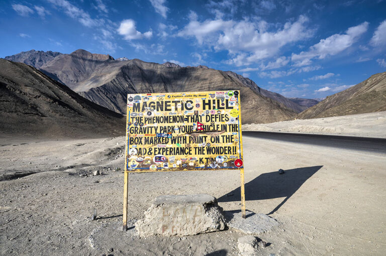 https://nomadicglobe.com/wp-content/uploads/2024/04/ladakh-magnetic-hill-3-768x511.jpg